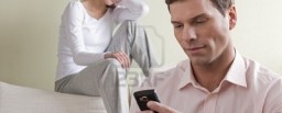 7471227-jealous-woman-looking-at-her-partner-chatting-on-the-phone